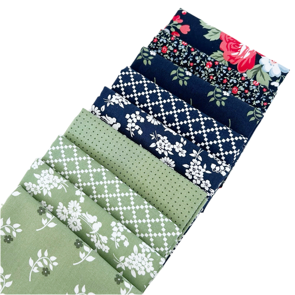 The Dwell Navy and Green Fat Quarter Bundle includes blue and green fabric designed by Camille Roskelley for Moda Fabrics.