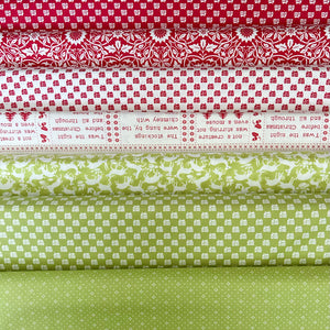 High quality Christmas quilting fabric designed by Fig Tree & Co. for Moda Fabrics. Red white and bright green Christmas fabric in traditional prints for quilters.