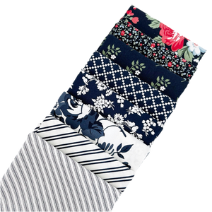 The Camille’s Navy Fat Quarter Bundle includes navy blue fabric designed by Camille Roskelley for Moda Fabrics. 