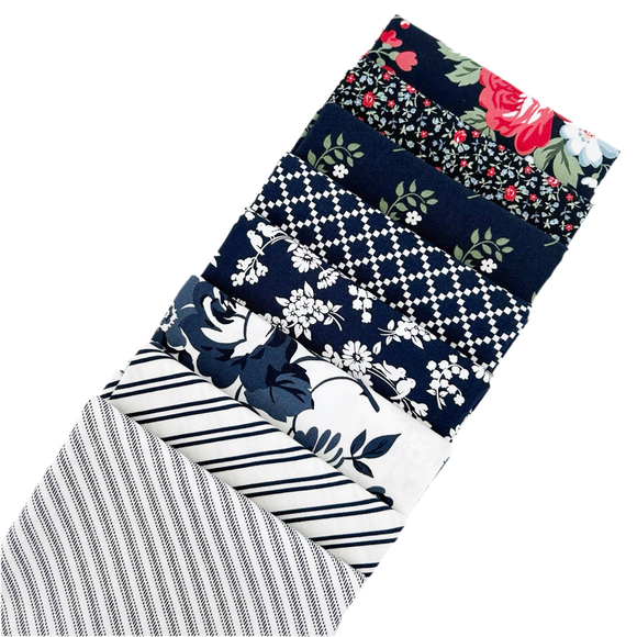 The Camille’s Navy Fat Quarter Bundle includes navy blue fabric designed by Camille Roskelley for Moda Fabrics. 