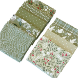 The Christmas Eve Green Fat Quarter Bundle includes green quilting fabric designed by Lella Boutique for Moda Fabrics.