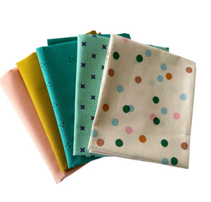 Set of colorful fabric swatches with patterns on a white background