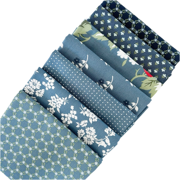 The Dusty blues fat quarter bundle includes a curated mix of prints from the Dwell fabric collection designed by Camille Roskelley for Moda Fabrics. 