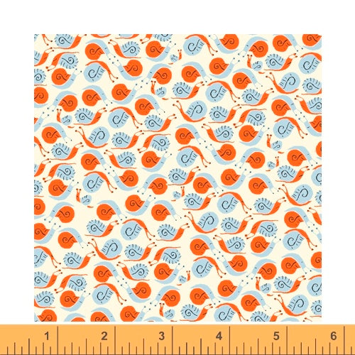 Snails in orange quilting fabric designed by Heather Ross for Windham fabrics .  20th Anniversary collection.