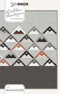 Mountainside quilt pattern designed by Lella boutiques for Moda fabrics.  Triangular moutain peaks with accent background fabric.