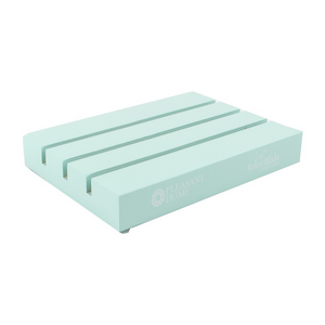 Ruler Pal mini is a painted piece of wood with shallow grooves made for holding quilting rulers.  Mint Color.  Designed by Pleasant Home for Riley Blake Designs.